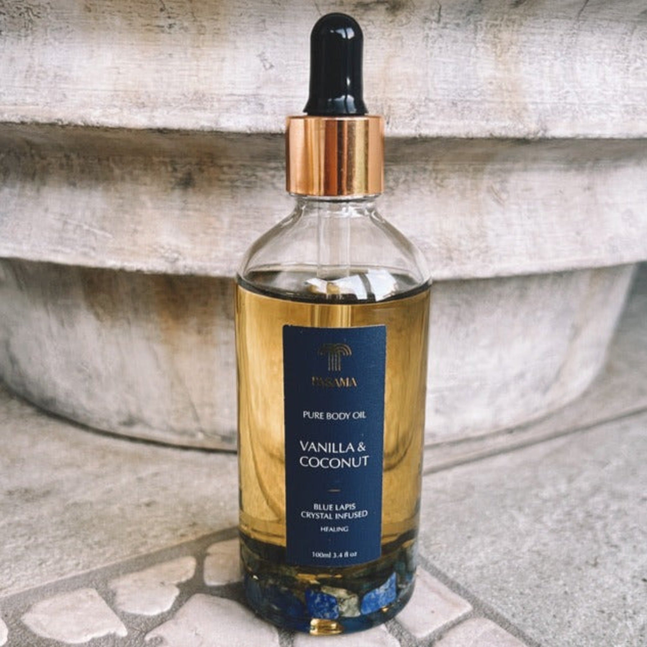 body oil in glass dropper bottle vanilla and coconut
