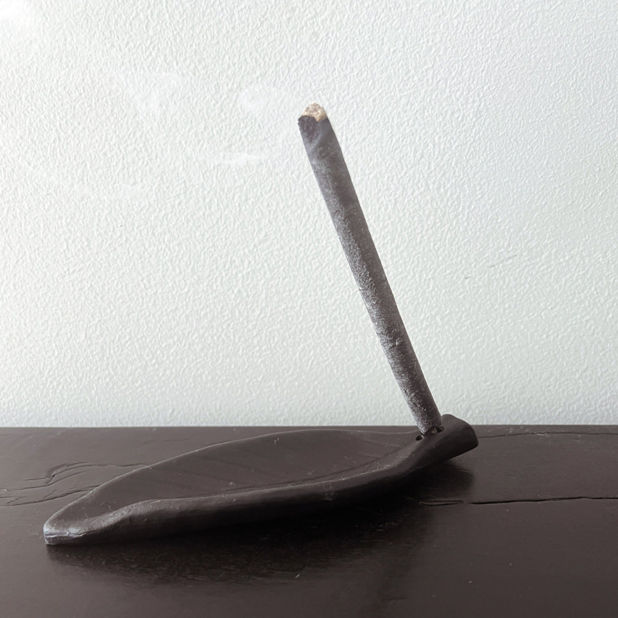 White sage incense sticks burning with smoke